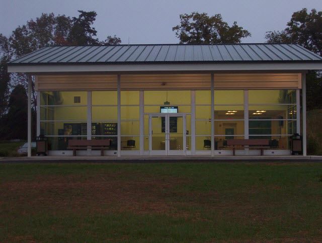 Front of Transfer Center with benches and windowed front view