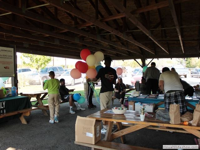 Man Holding Balloons